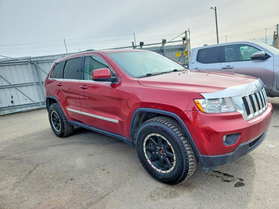 Jeep GRAND CHEROKEE LAREDO 2012 — Copart
