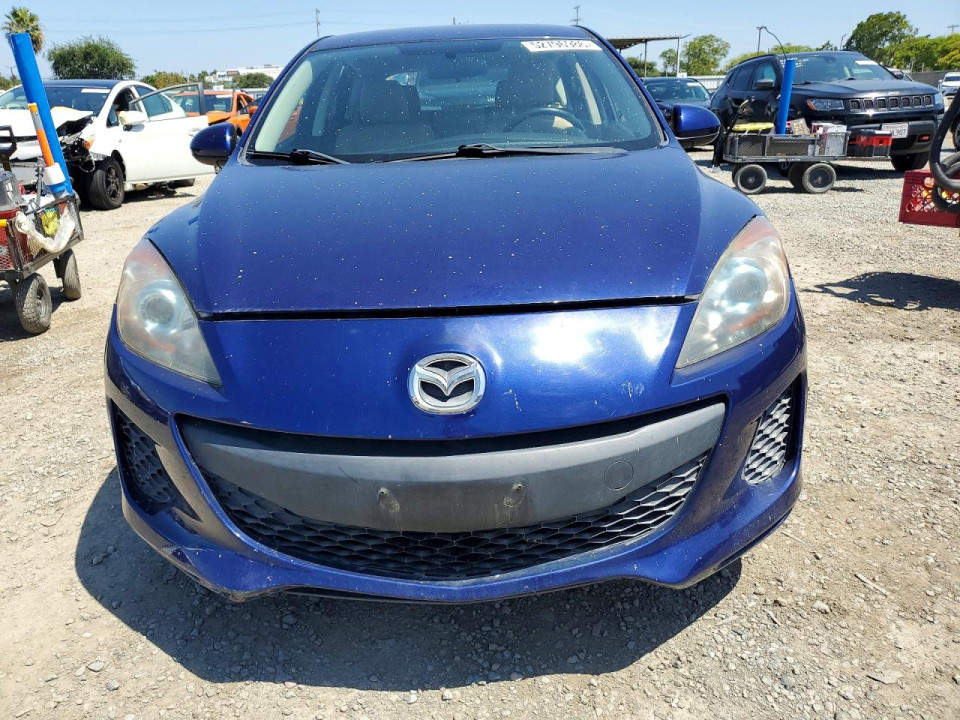 Mazda 323 2012 — Copart