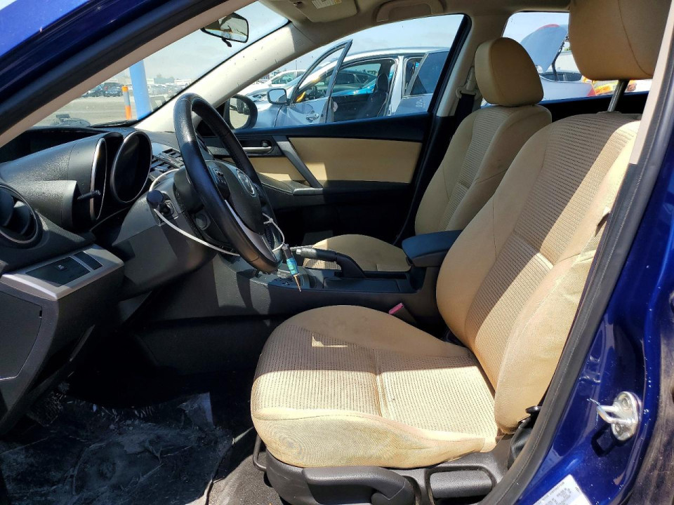 Mazda 323 2012 — Copart